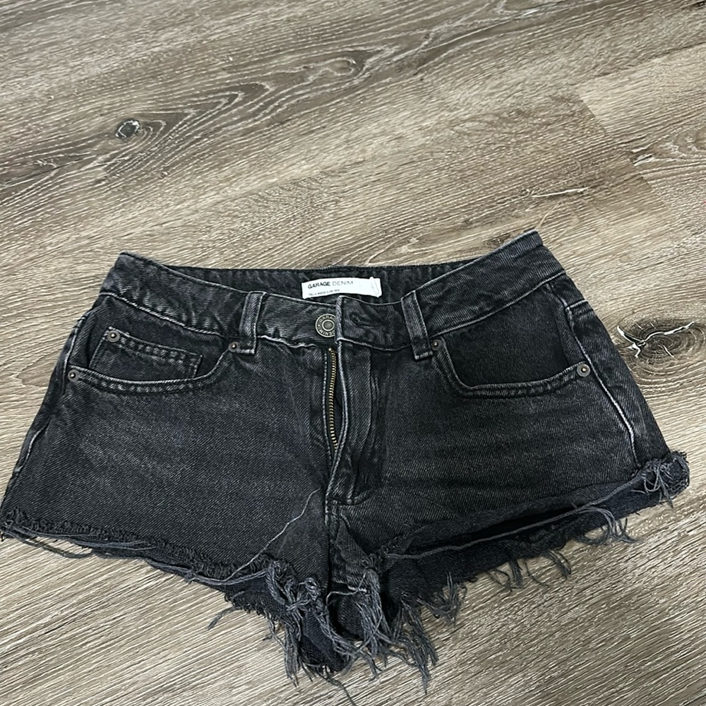 Faded black cutoff shorts from garage